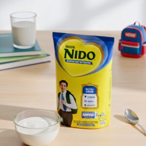 Home 12 Nestlé NIDO School Age Nutrition Milk Powder, 900g pouch for growing children.